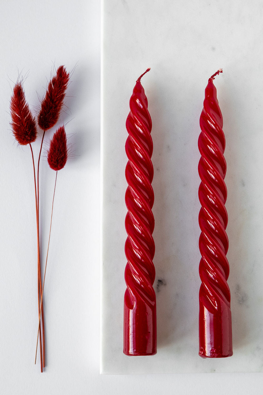 Set of spiral candles in vine red color